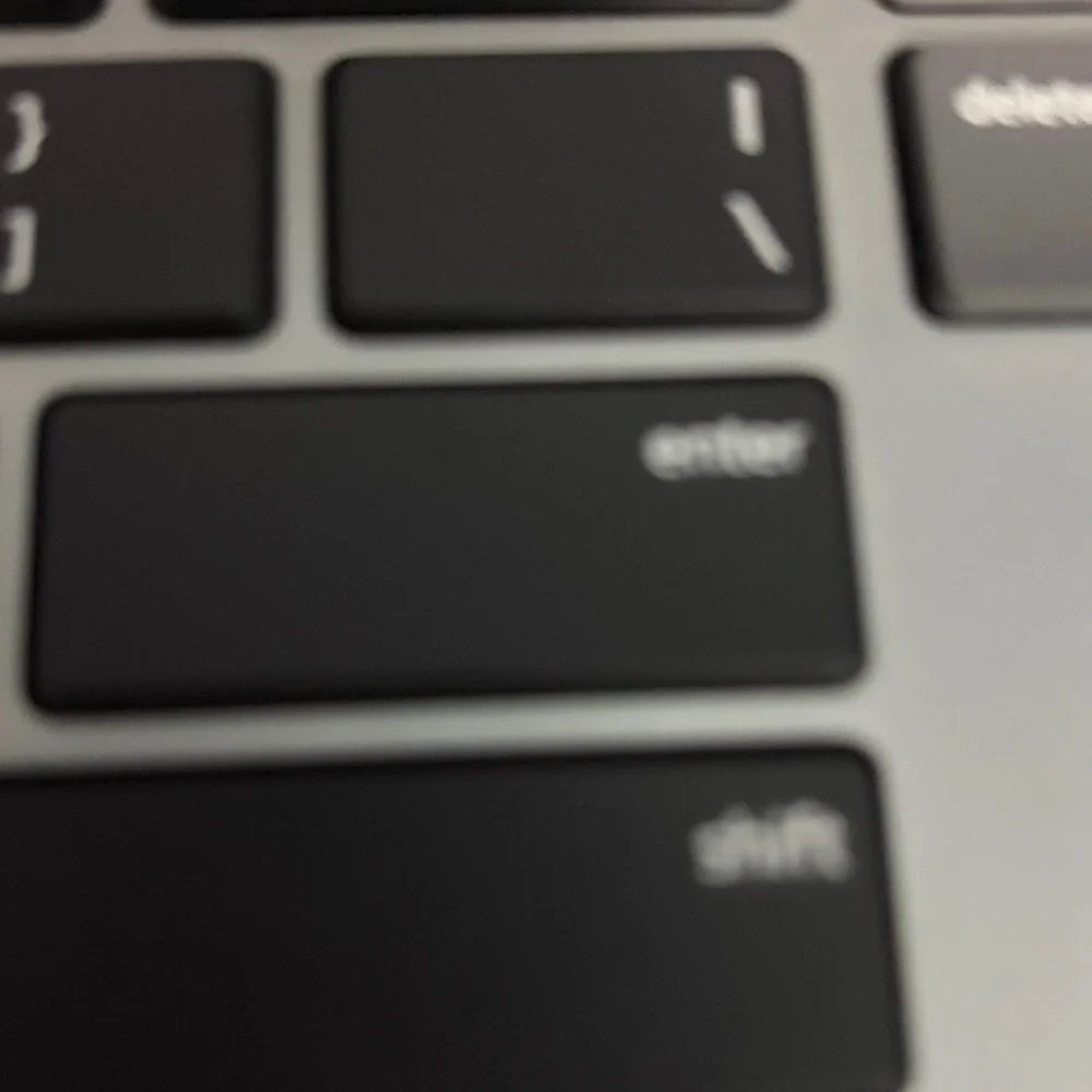 Sleek Black and Silver Laptop Keyboard